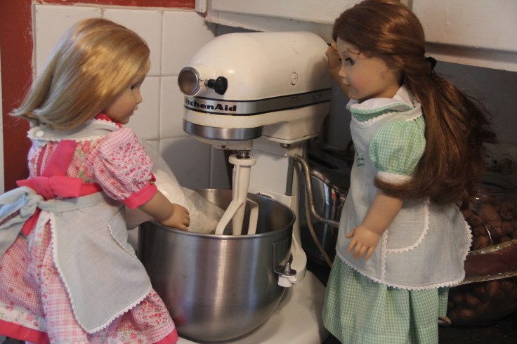  Felicity and Nellie bake a cake on the "Stitching with Ellie" blog