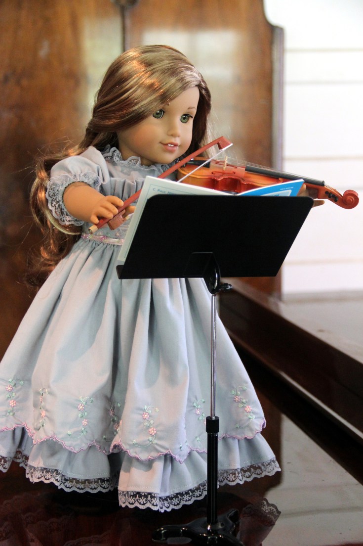 Lea loves to play her Violin- 18" doll adventures by stitching with Elli