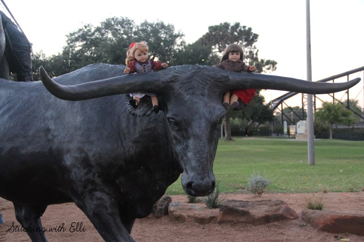 Herd those cows!! the dolls are having fun exploring waco Texas- a 18" doll photo story by Stitching with Elli