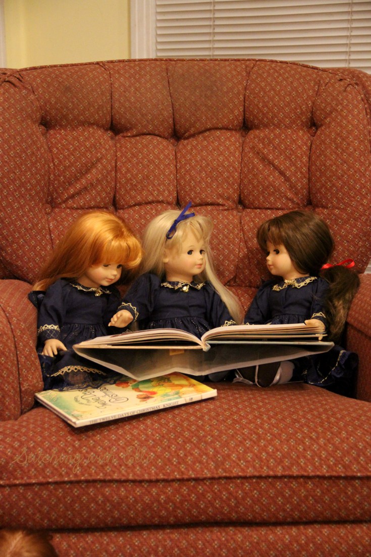 Reading Christmas books by the fire- Christmas with American Girls by Stitching with Elli