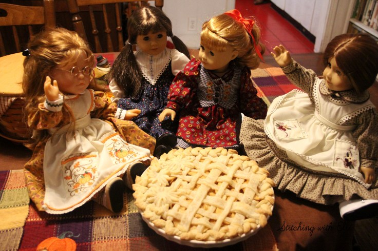 The great Thanksgiving pie bake! The girls are working on Apple pies- A Thanksgiving story with American girl dolls by Stitching with Elli