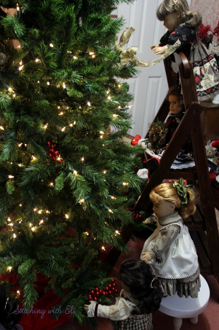 Putting up lights is hard work for dolls!- an American girl Christmas photostory by Stitching with Elli