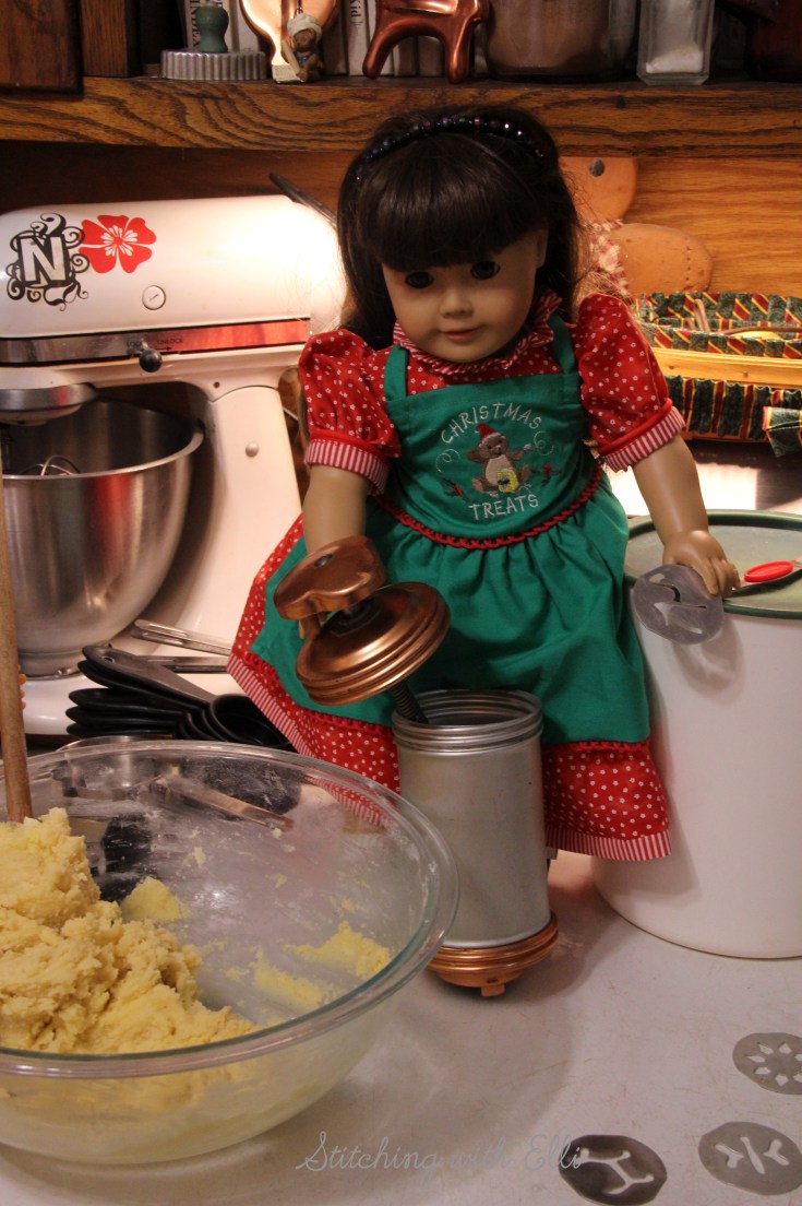 Ellen is baking Spritz cookies- a Christmas doll story by Stitching with Elli