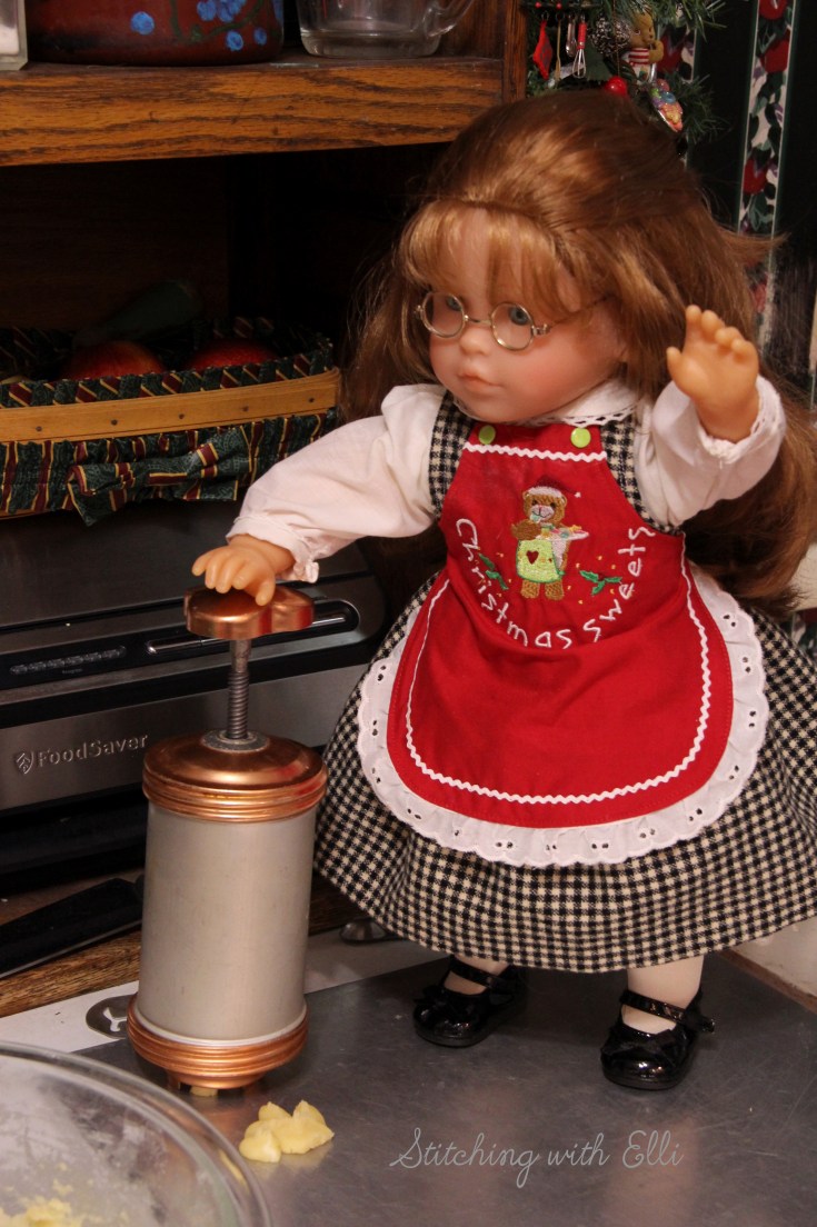 Ellen is baking Spritz cookies- a Christmas doll story by Stitching with Elli