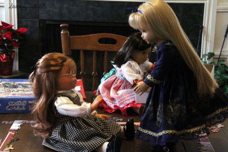 Spending time together working on a puzzle is a fun thing to do around Christmas time- by Stitching with Elli