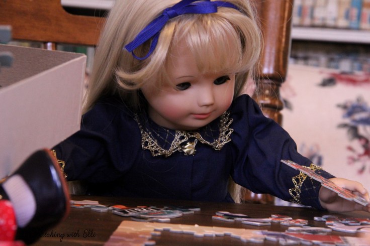 Spending time together working on a puzzle is a fun thing to do around Christmas time- by Stitching with Elli