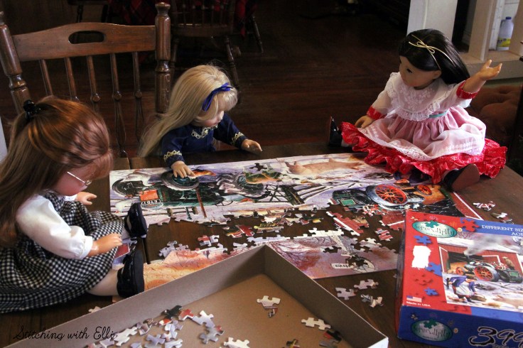 Spending time together working on a puzzle is a fun thing to do around Christmas time- by Stitching with Elli