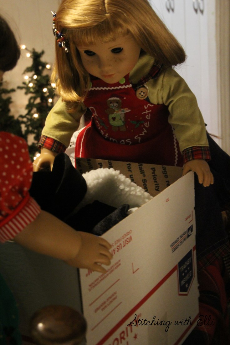 Nellie is packing the box for the soldiers- American Girl photo story by Stitching with Elli