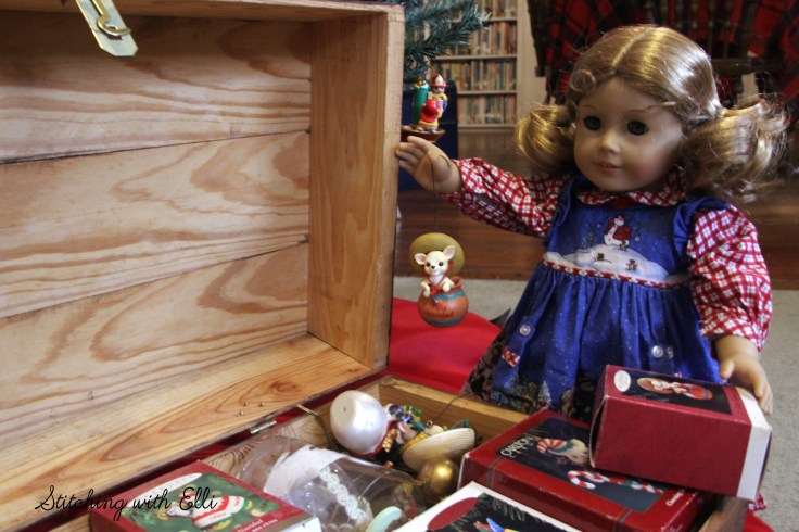 Elizabeth and Debbie help hang the ornaments on the tree- an American girl story by Stitching with Elli