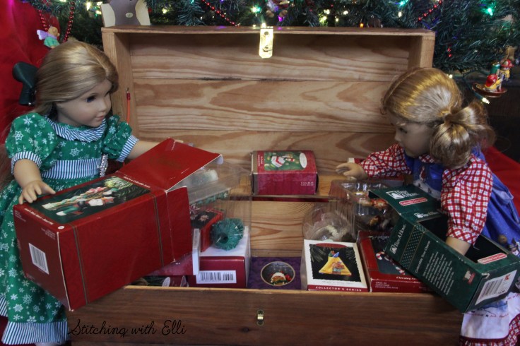 Elizabeth and Debbie help hang the ornaments on the tree- an American girl story by Stitching with Elli