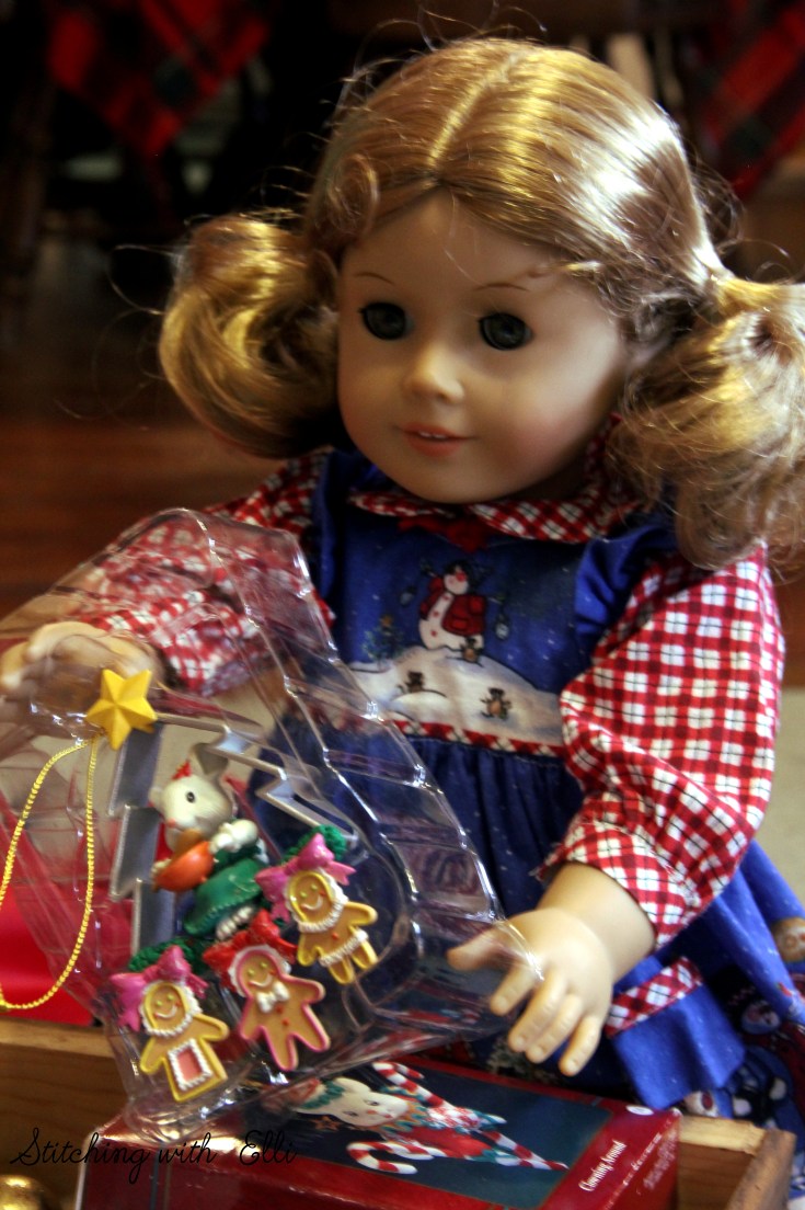 Elizabeth and Debbie help hang the ornaments on the tree- an American girl story by Stitching with Elli