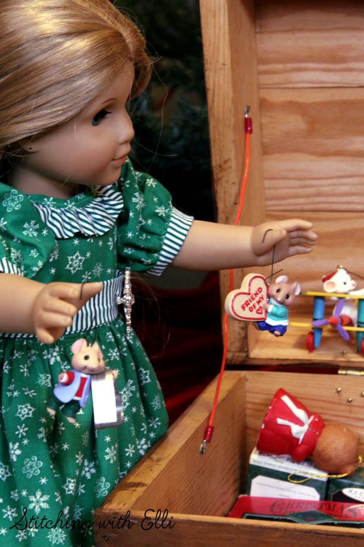 Elizabeth and Debbie help hang the ornaments on the tree- an American girl story by Stitching with Elli