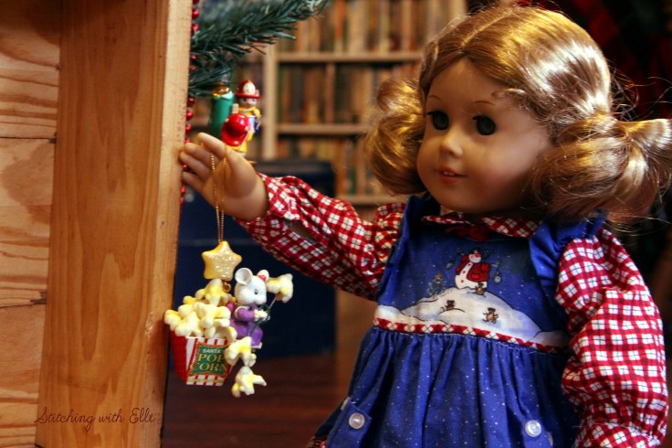 Elizabeth and Debbie help hang the ornaments on the tree- an American girl story by Stitching with Elli