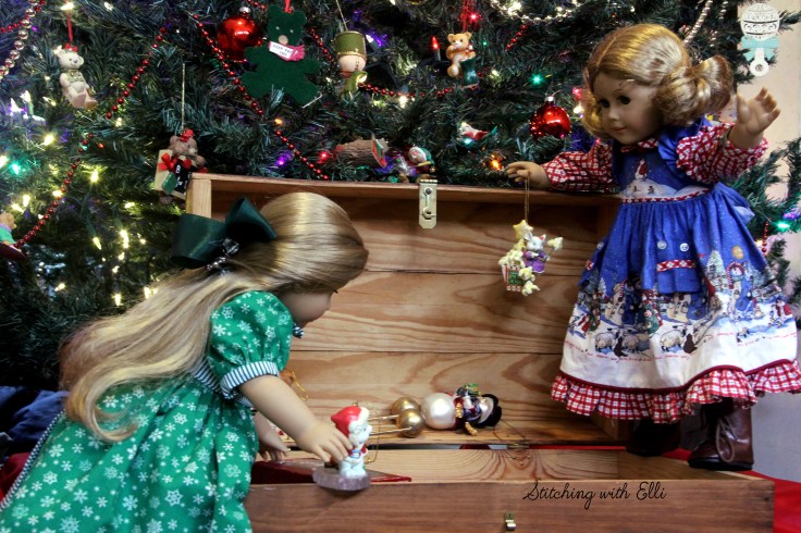 Elizabeth and Debbie help hang the ornaments on the tree- an American girl story by Stitching with Elli
