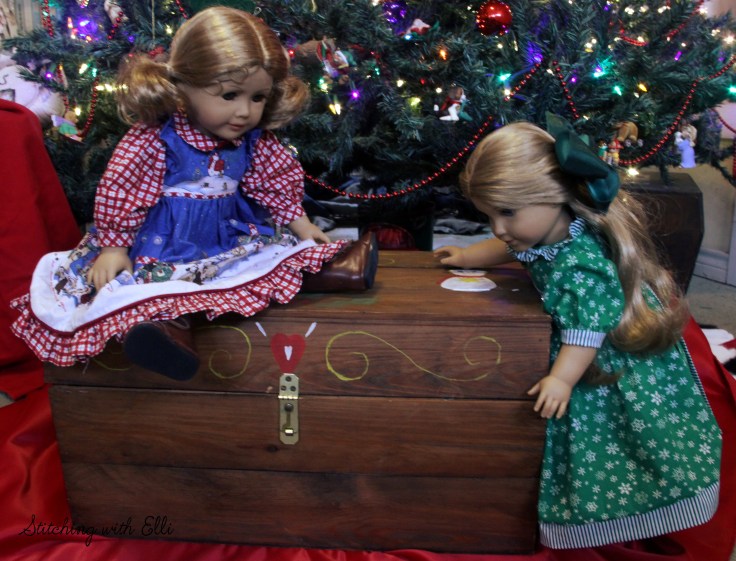 Elizabeth and Debbie help hang the ornaments on the tree- an American girl story by Stitching with Elli
