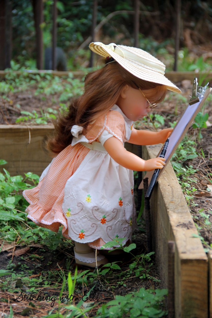 Ellen inspects the vegetable garden. See the whole story on www.stitchingwithelli.com