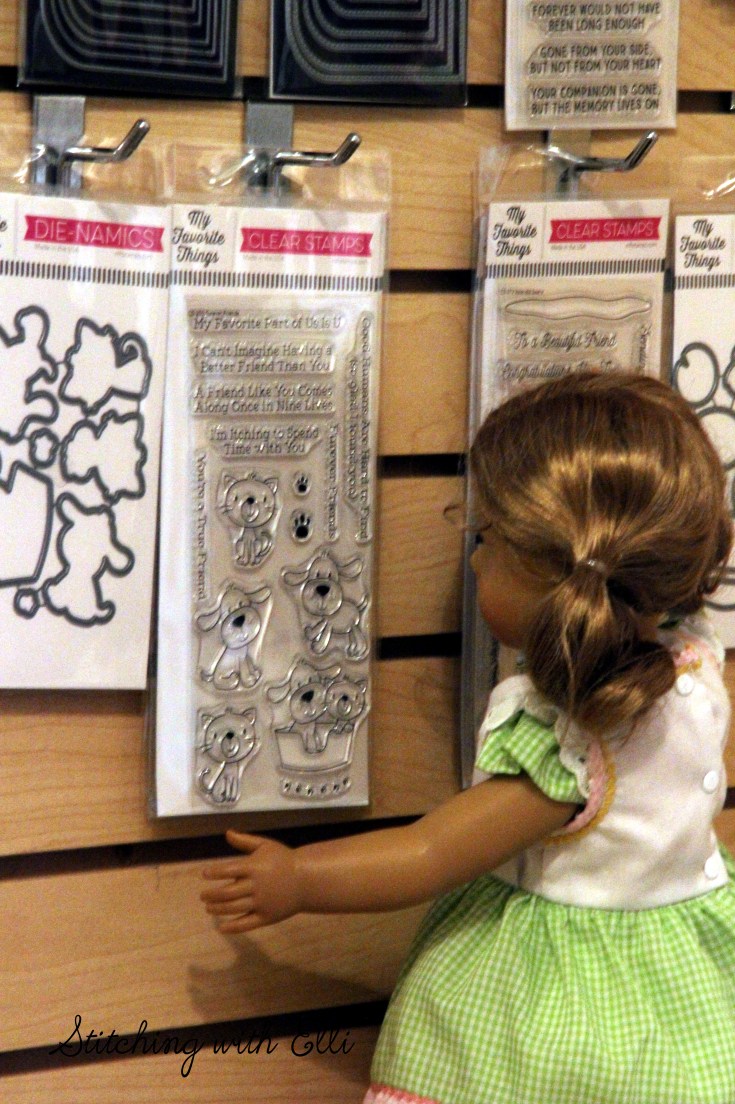 Dolls in a scrapbooking store- see the whole story on www.stitchingwithelli.com