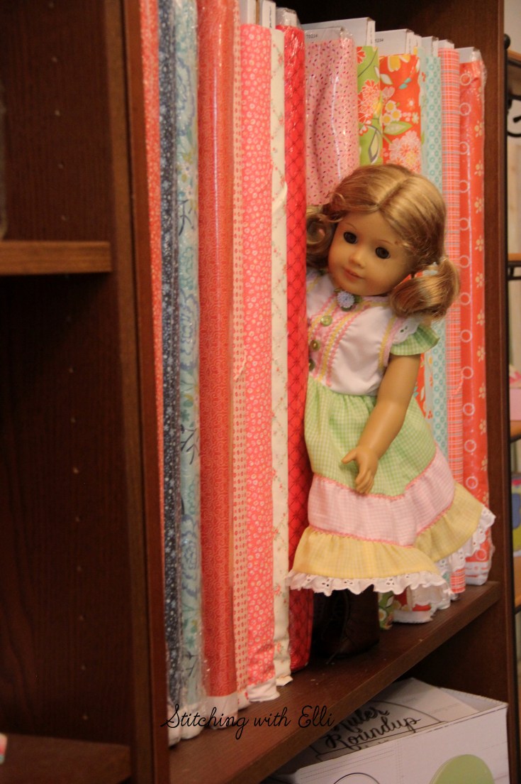 Dolls in a sewing store- see the whole story on www.stitchingwithelli.com